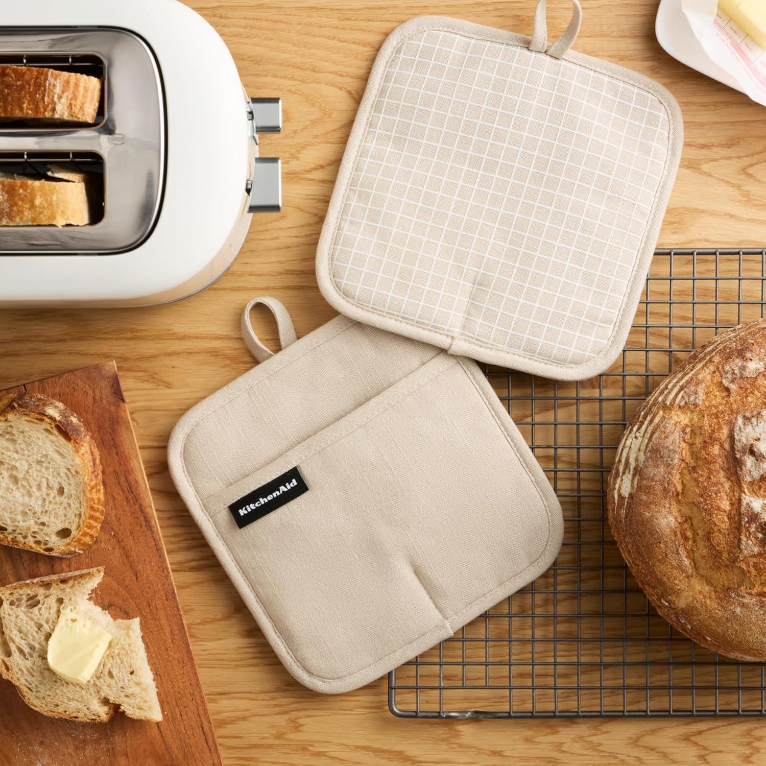 imageKITCHENAID Gourmet Series Gridlines Pot Holders 2Pack Set Heat Resistant up to 600F Soft Silicone Grip Magnetic Cuff Dried Rose 8quotx8quotMilkshake Tan