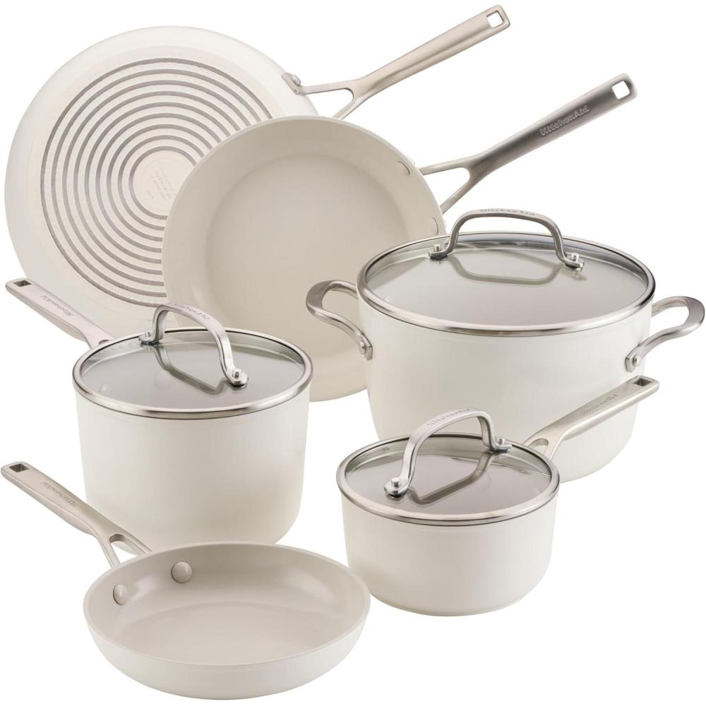 imageKitchenAid Hard Anodized Ceramic Induction Nonstick Pots and Pans with Saucepans Frying Pans Stockpot and Lids Dishwasher Safe 9 Piece Cookware Set with Stainless Steel Handles Porcelain WhitePorcelain